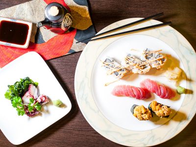 Octopus sashimi, spicy scallop maki, urchin nigiri, and tuna nigiri at Sushi Shige.
